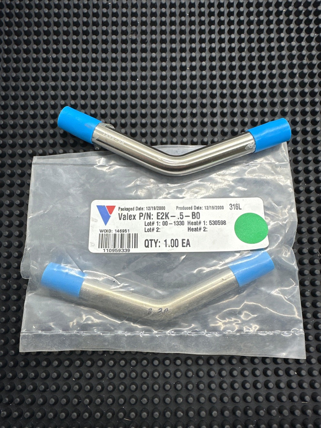 Cleaned, capped and bagged 316L stainless steel high-purity fittings with lot and heat number traceability labels